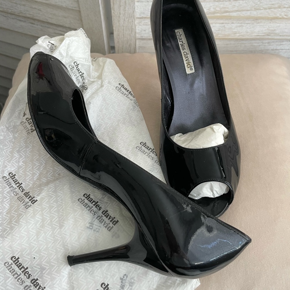 Patient Leather Peep toe pumps
